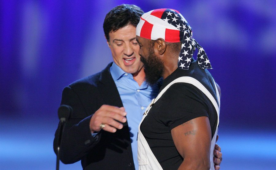 A photo of Sylvester Stallone and Mr. T on stage.