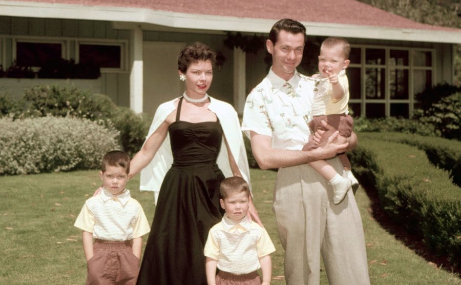 A photo of Johnny Carson with his first wife and their sons.