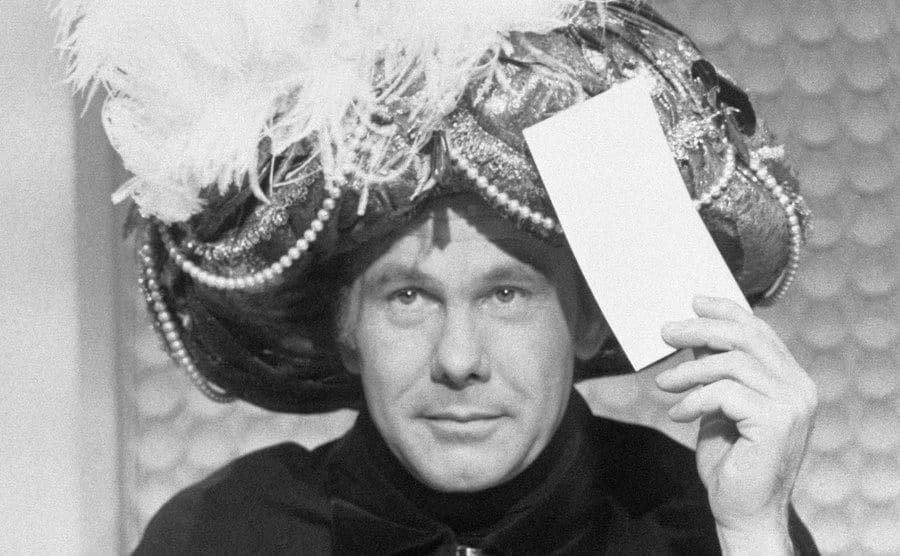 A still of Carson as Carnac in an episode from the show.