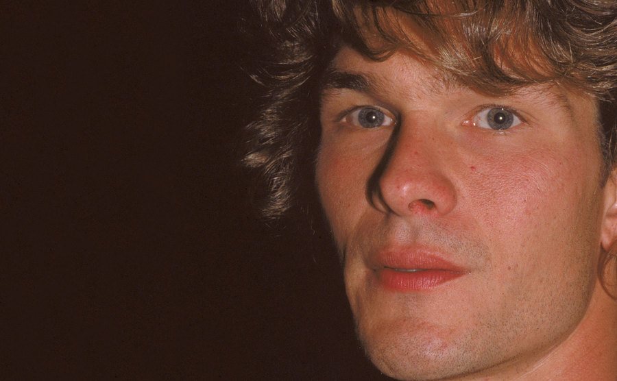 A headshot of a young Patrick Swayze.