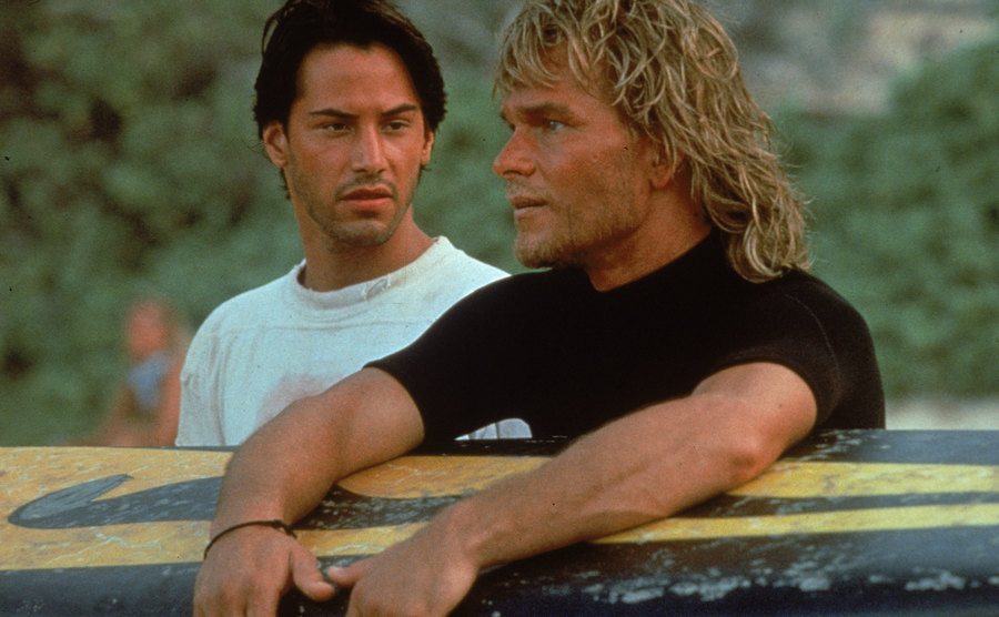 Keanu Reeves and Swayze in a still of the film.