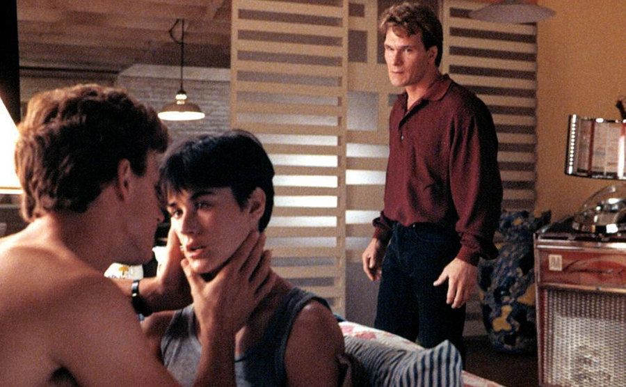 Tony Goldwyn, Demi Moore, and Patrick Swayze in a still from the film.