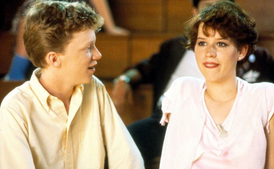 Anthony Michael Hall and Molly Ringwald are in a scene from the film.