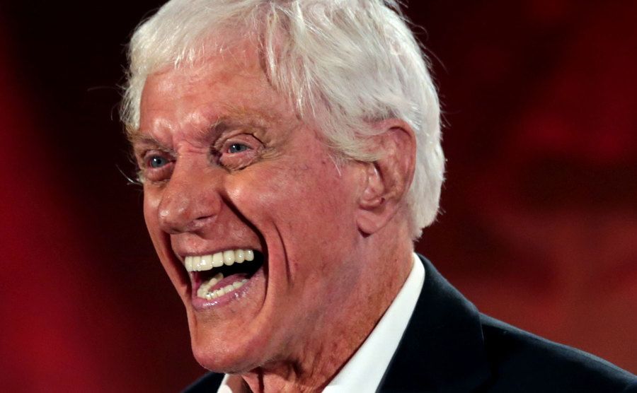 A photo of Dick Van Dyke on stage.