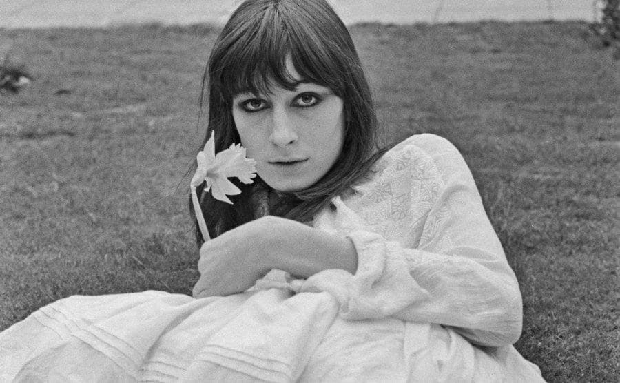 A portrait of a young Anjelica Huston.