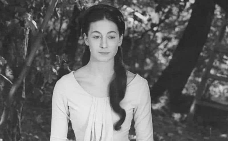 A still of Anjelica in a scene from the film.