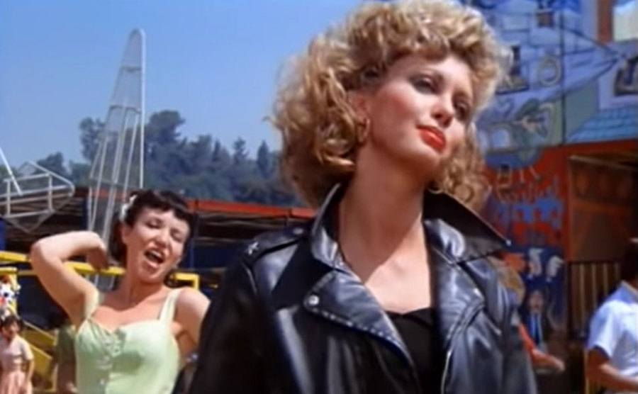A still of Newton-John in a scene from the film Grease.