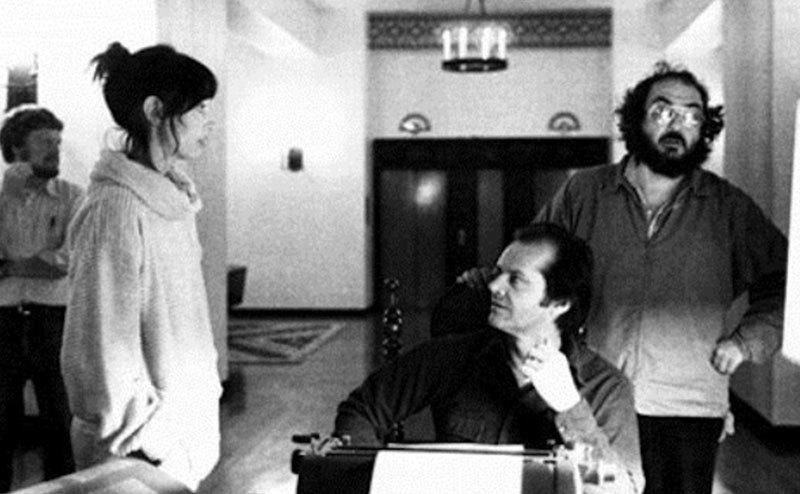 A photo of Duvall, Nicholson, and Kubrick behind the scenes.