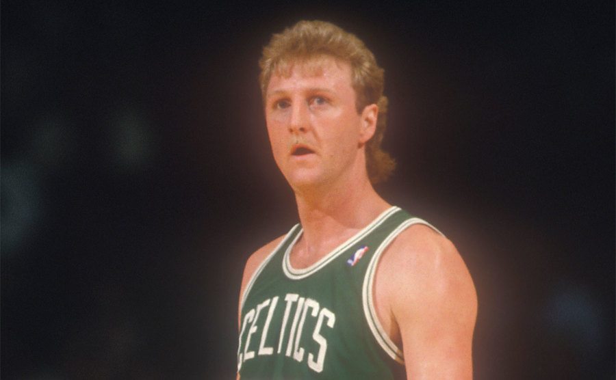 Larry Bird #33 of the Boston Celtics looks on during a basketball game. 