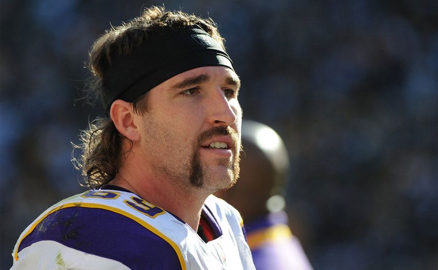 Jared Allen #69 of the Minnesota Vikings looks on from the sideline during a game. 