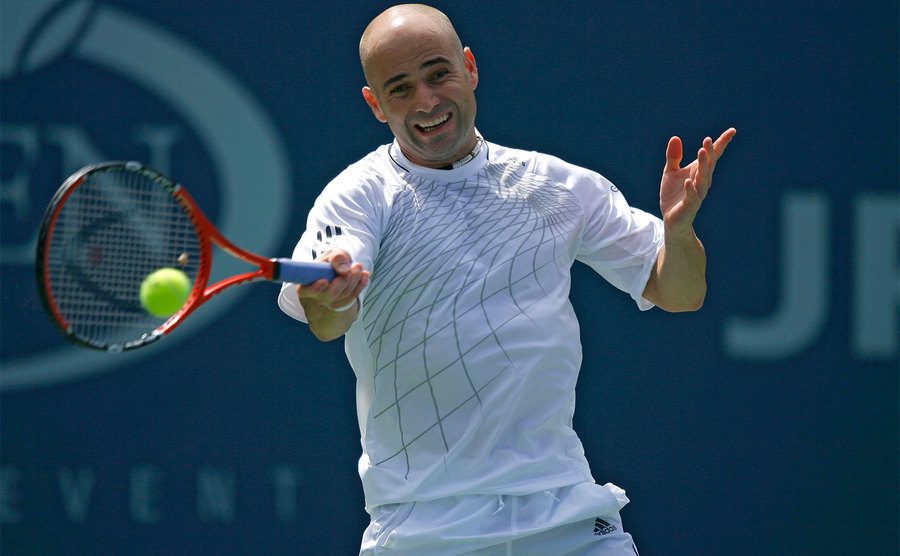 Andre Agassi plays against Benjamin Becker at the 2006 US Open.
