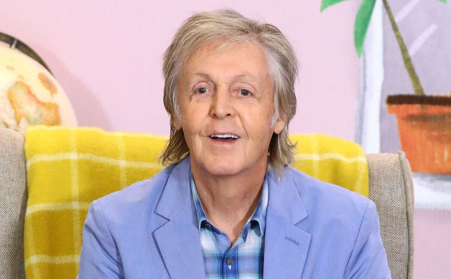Sir Paul McCartney reads to children at the 