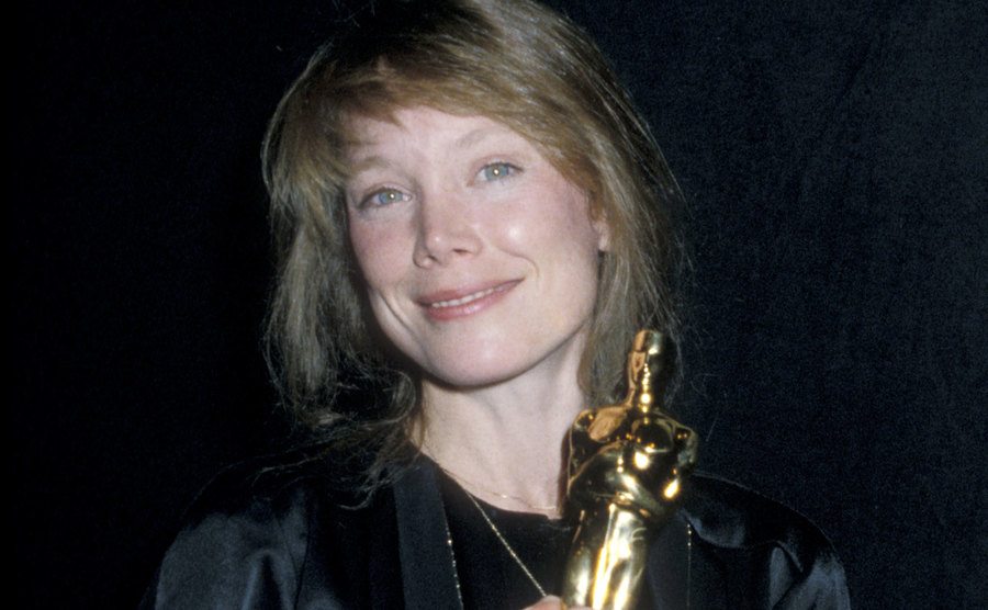 A photo of Sissy Spacek posing backstage at the Oscars.