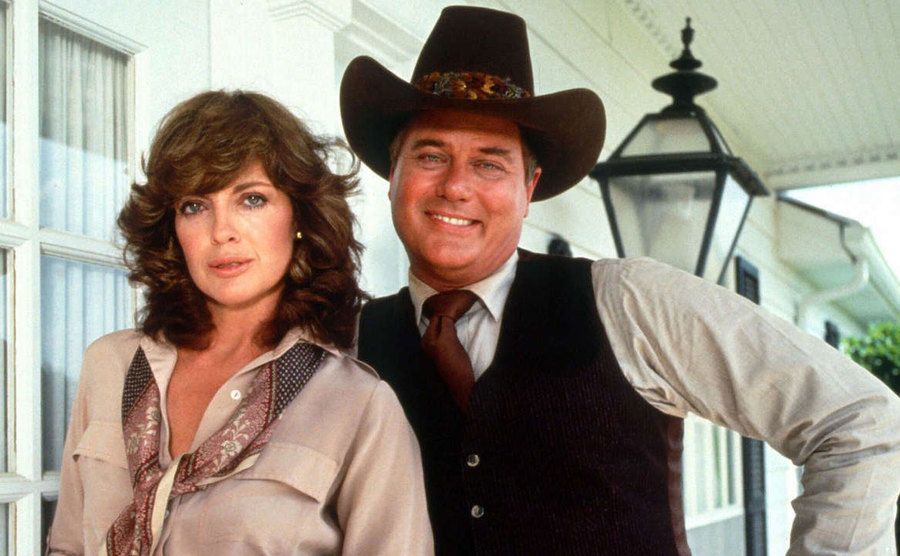Gray and Hagman pose of the set of Dallas. 