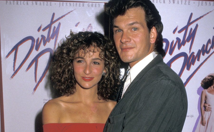 Grey and Swayze pose for the press at the film premiere.