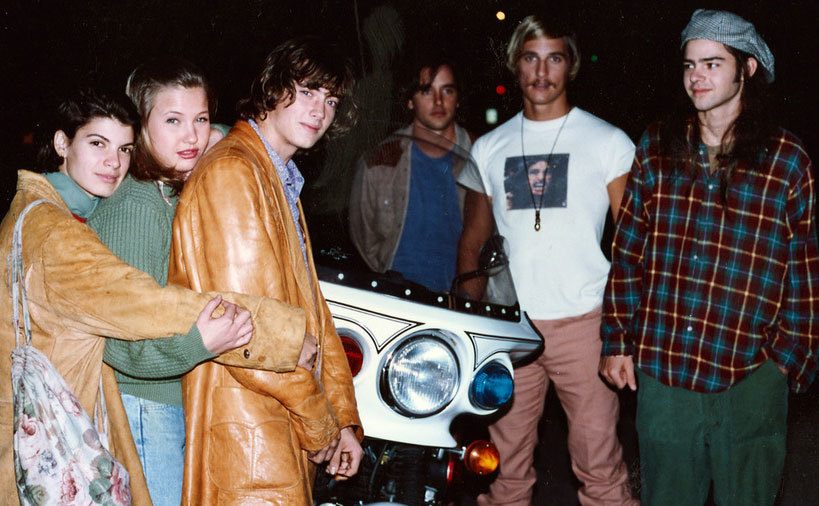 The cast of Dazed and confused pose for a photo on set. 
