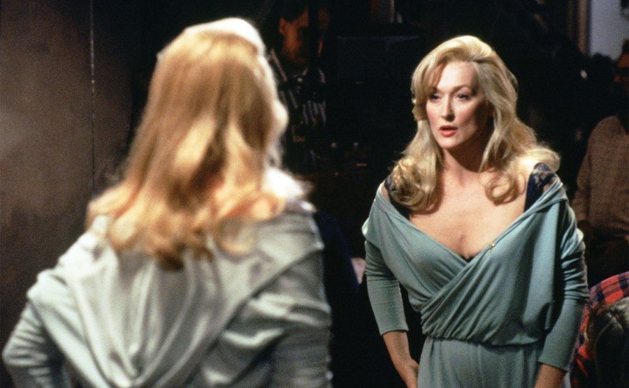 Meryl Streep, as Madeline Ashton, stares at herself in the mirror. 