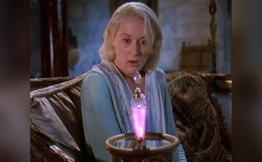 Streep stares blankly at the potion bottle. 