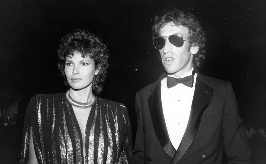 Raquel Welch and André Weinfeld attend an event.