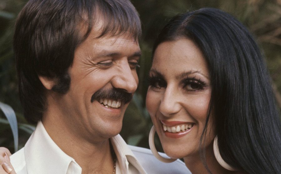 Sonny and Cher pose for a portrait at home. 