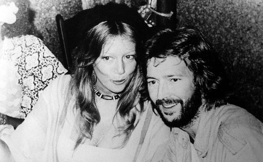 Patti Boyd and Eric Clapton posed at a party