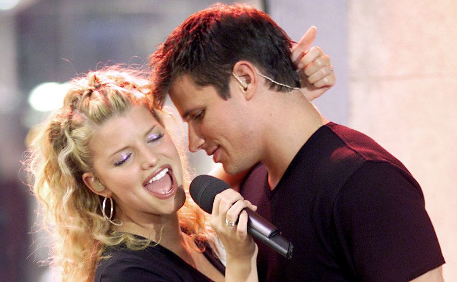 Jessica Simpson and Nick Lachey are performing their hit song 'Where You Are' on TRL. 
