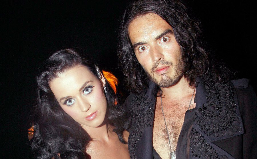Katy perry and Russell Brand attend John Galliano Pret a Porter show. 