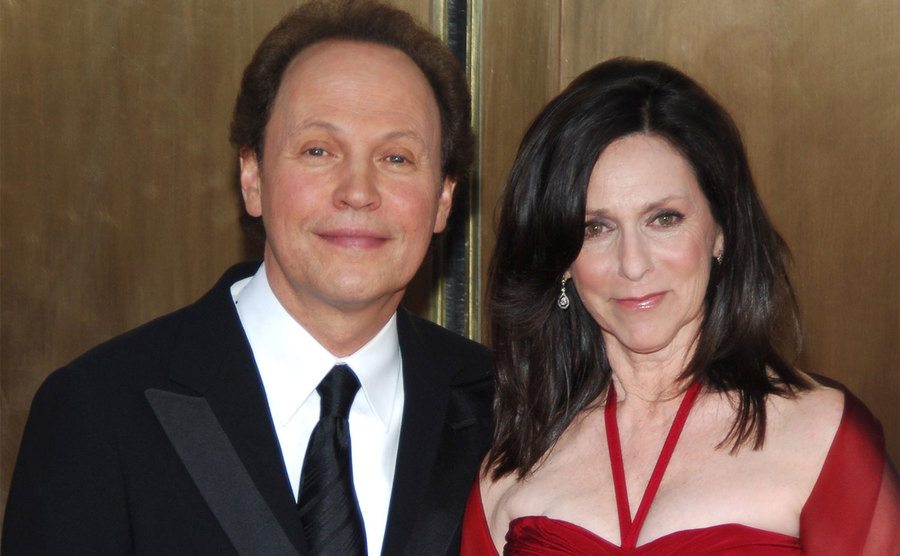 Billy Crystal and Janice Crystal walk the red carpet. 