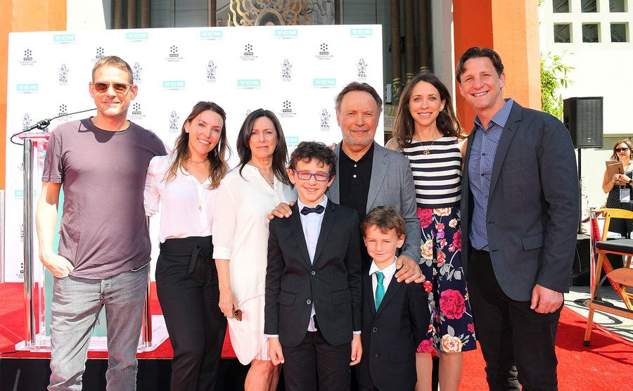 Billy Crystal poses with his extended family. 